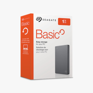 Boîte blanche et orange de disque dur externe SEAGATE BASIC 1To, illustrant stockage facile ; texte anglais et français.